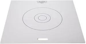 White slump flow base plate marked with concentric circles and a handle slot