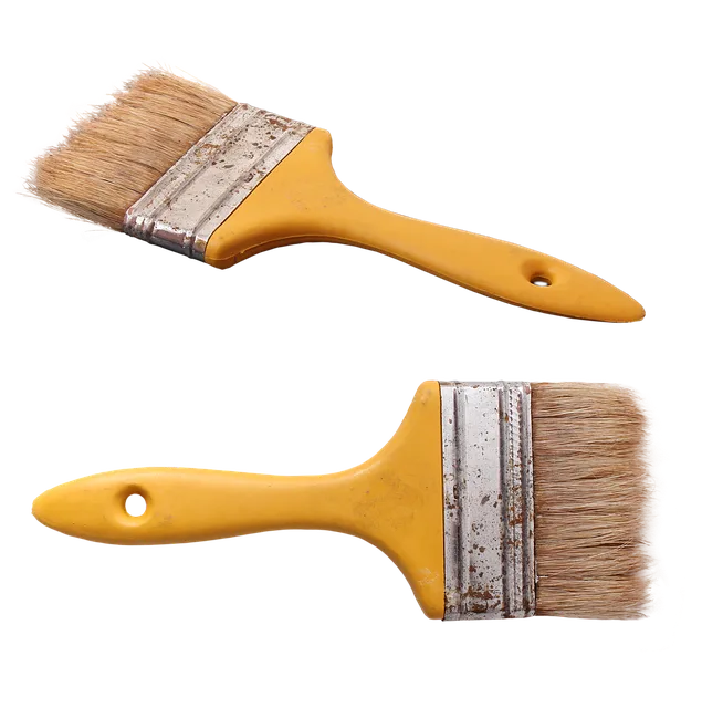 Two yellow-handled bristle brushes