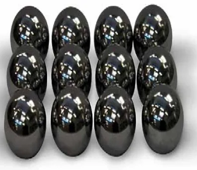 Twelve polished steel balls used as abrasive charges in the Los Angeles machine