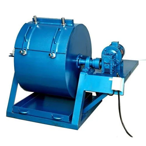 Los Angeles abrasion testing machine: a blue steel drum with a bolted cover on a frame, driven by a motor